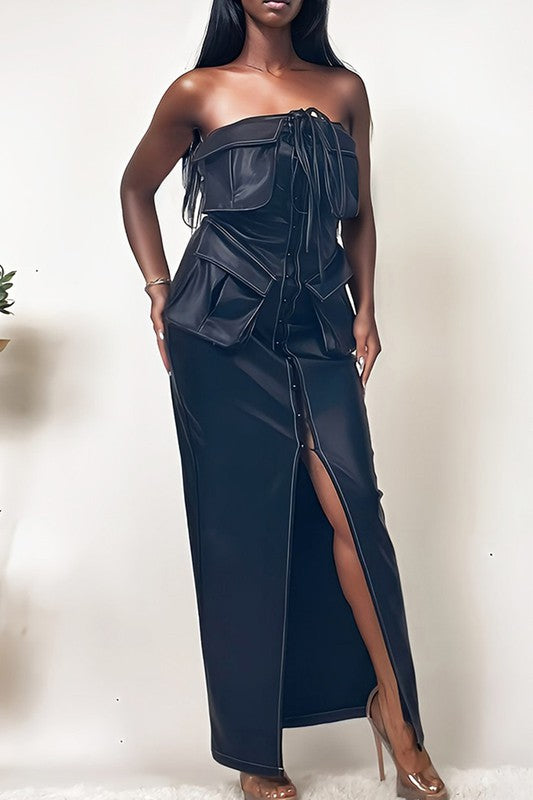 Black leather dress with button details from Jade Icarus, featuring a fitted design and smooth PU leather material.