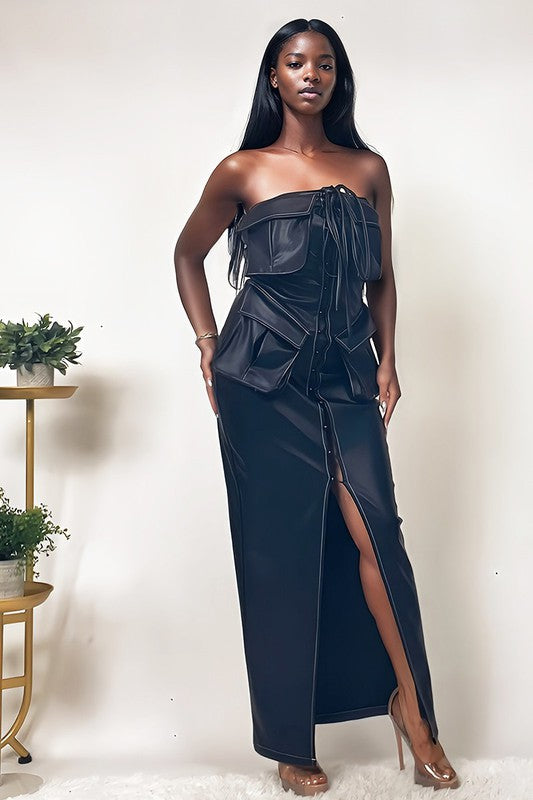 Black leather dress by Jade Icarus featuring button details and PU material, designed for women, shown on a model.