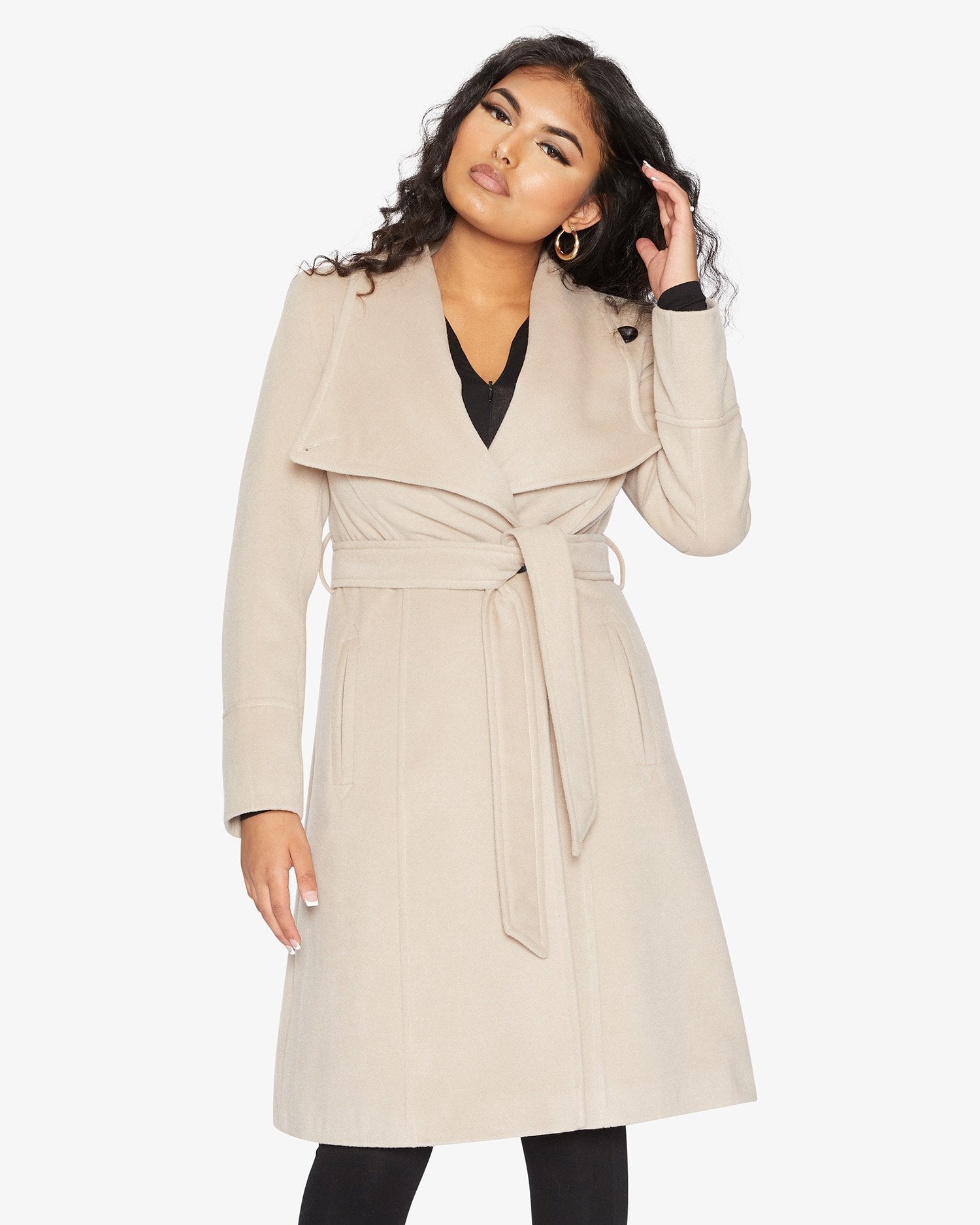 Rose Eleusis waterfall lapel double-breasted duster coat displayed on a hanger, showcasing its elegant design and flowing fabric.