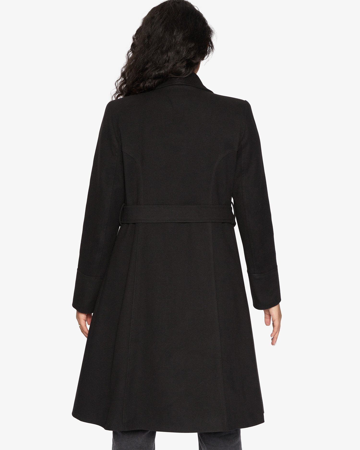 Rose Eleusis waterfall lapel double-breasted duster coat hanging on a clothing rack, showcasing its elegant design and fabric details.
