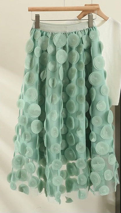 Polka dot skirt by Jade Icarus featuring a classic polka dot pattern, displayed on a mannequin with a focus on fabric and design details.