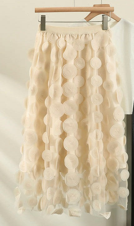 Automotive polka dot skirt by Jade Icarus, featuring a black and white polka dot pattern and fabric details.