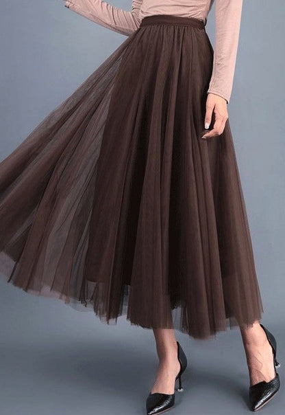 Automotive Jade Icarus Midi Skirt in metallic finish, featuring detailed stitching and a sleek, modern design.