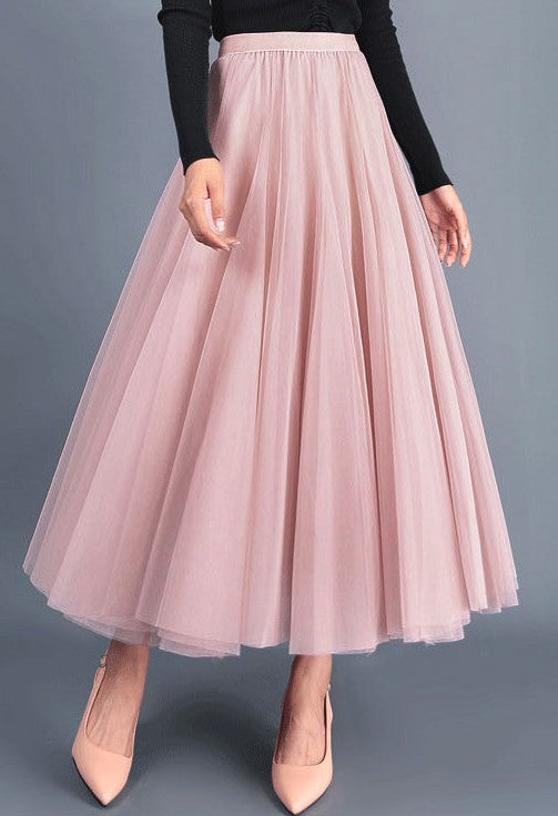 Automotive Jade Icarus midi skirt with sleek design and metallic finish, displayed on a mannequin against a neutral background.