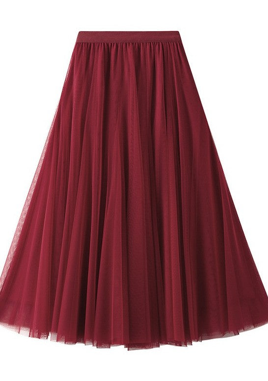 Automotive Jade Icarus midi skirt featuring sleek fabric and stylish design, laid flat on a neutral background.