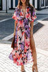 Floral midi dress by Jade Icarus featuring a vibrant floral pattern and flowing silhouette.