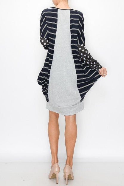 Yellow Hera color block long sleeve dress with pocket, featuring a stylish design and casual fit, shown on a model.