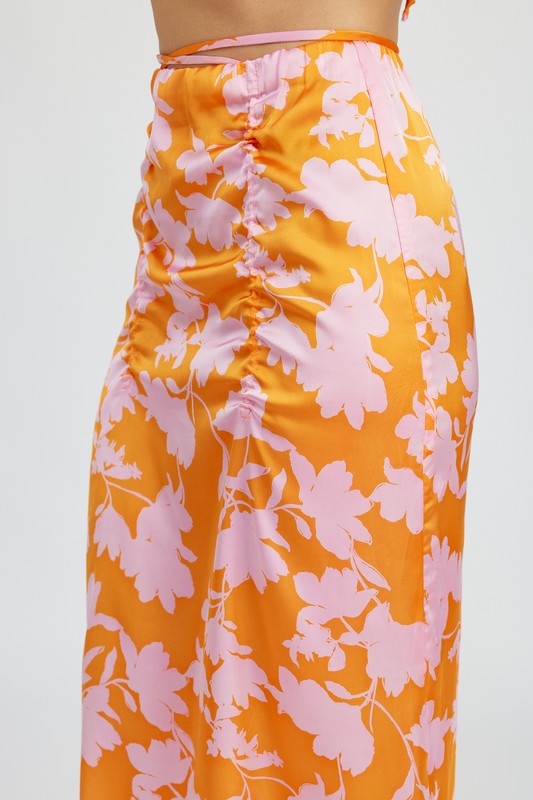 Automotive Jade Icarus ruched maxi skirt with waist drawstring, featuring detailed fabric texture and adjustable waistband.
