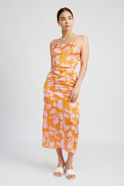 Automotive-themed Jade Icarus ruched maxi skirt with waist drawstring, shown in a stylish design with fabric details.