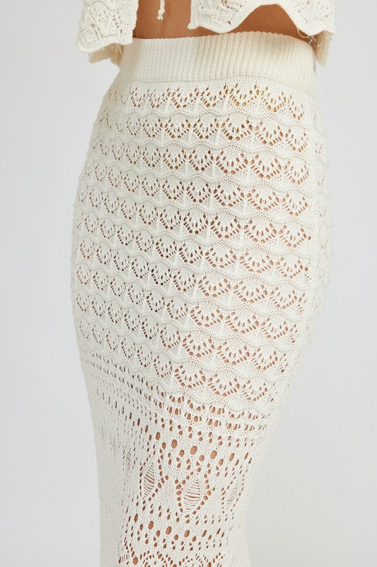 Automotive fitting crochet maxi skirt with slit by Jade Icarus, styled as a fashion garment in a detailed image.
