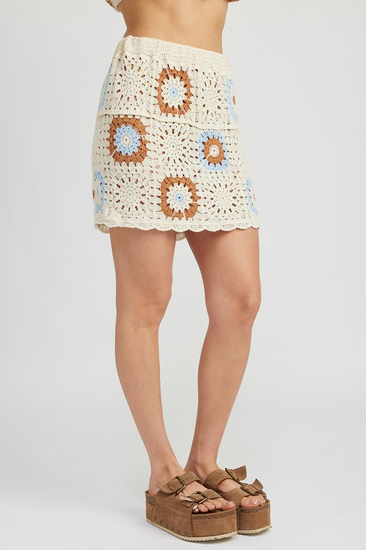 Automotive Jade Icarus high waist crochet mini skirt with detailed knit pattern, showcased in a close-up image.