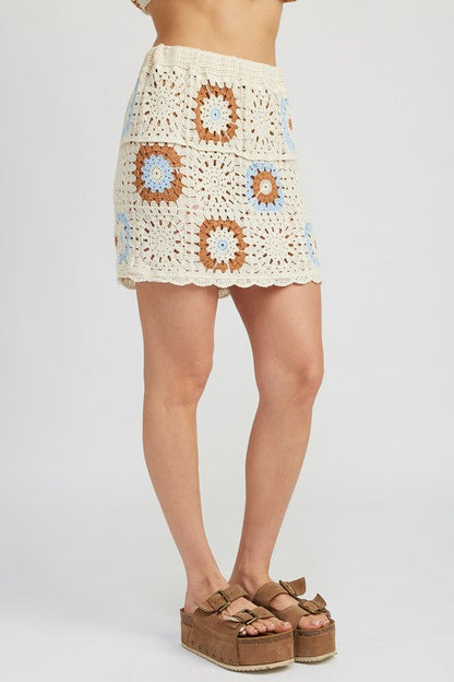 Automotive Jade Icarus high waist crochet mini skirt with detailed knit pattern, showcased in a close-up image.