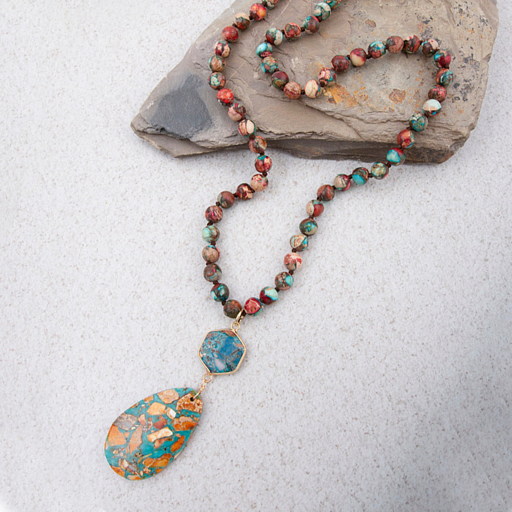 Rainbow Jasper long pendant necklace by Start2Finish featuring a colorful, polished gemstone pendant on a delicate chain.