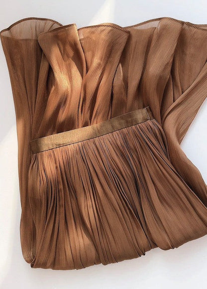 Mid-length Jade Icarus A-line skirt in soft fabric, flowing design, perfect for casual or office wear, displayed on a model.
