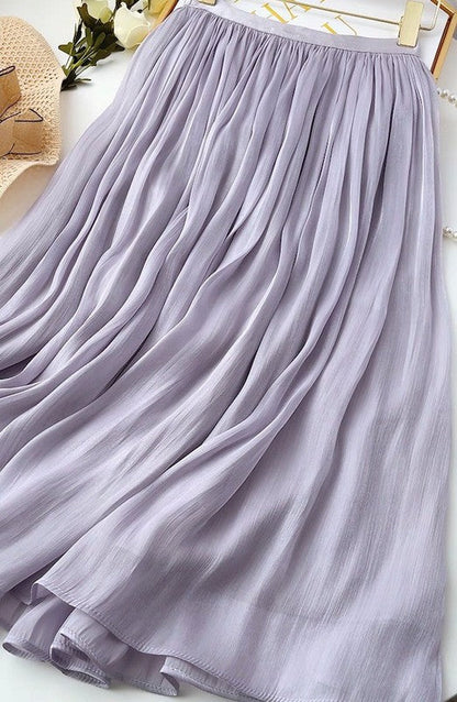 Mid-length Jade Icarus A-line skirt for women, featuring a flowy design and neutral color, perfect for casual or semi-formal wear.