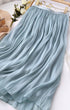 Mid-length Jade Icarus A-line skirt in denim fabric, displayed on a hanger with a plain background.