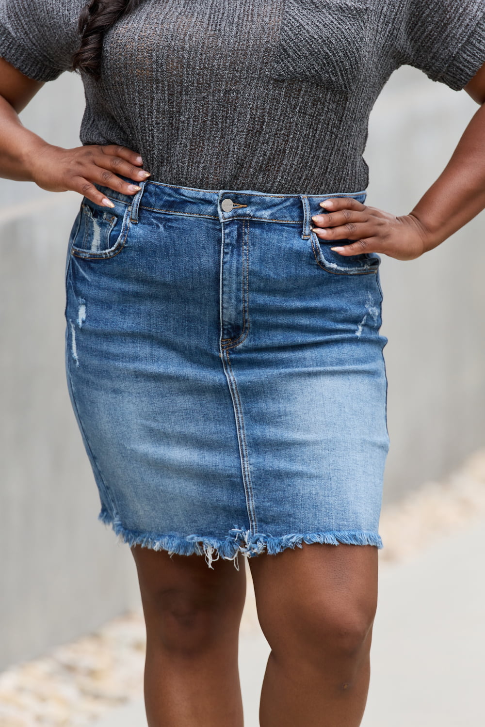 Jade Icarus RISEN Amelia full-size denim mini skirt for women, featuring classic blue denim with stitching details.