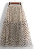 Polka dot midi skirt by Jade Icarus, featuring a stylish automotive-inspired design with a flowing silhouette.