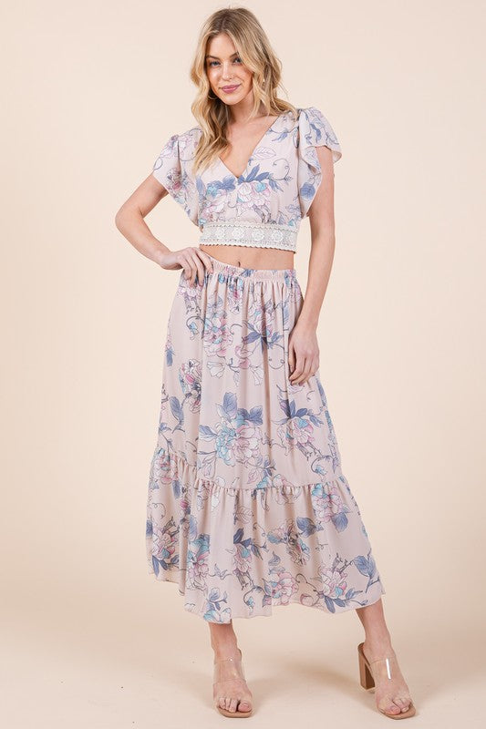 Automotive Jade Icarus Ruffle Bottom Floral Print Skirt with vibrant floral design and ruffled hem details.