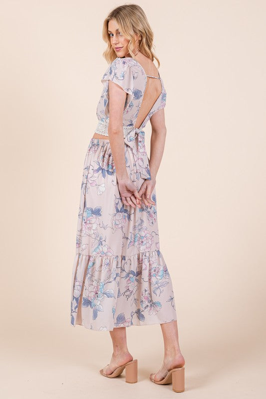 Automotive component from Jade Icarus featuring a ruffle bottom floral print design, with intricate details and colorful patterns.