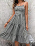 Striped spaghetti strap midi dress for women by Jade Icarus, featuring a fitted waist and below-the-knee length.