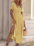 Floral V-neck midi dress by Jade Icarus featuring a fitted waist and flowy skirt, perfect for elegant daytime wear.