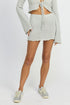 Jade Icarus lettuce hem crochet mini skirt, fashion style with detailed crochet pattern and lettuce hem design.