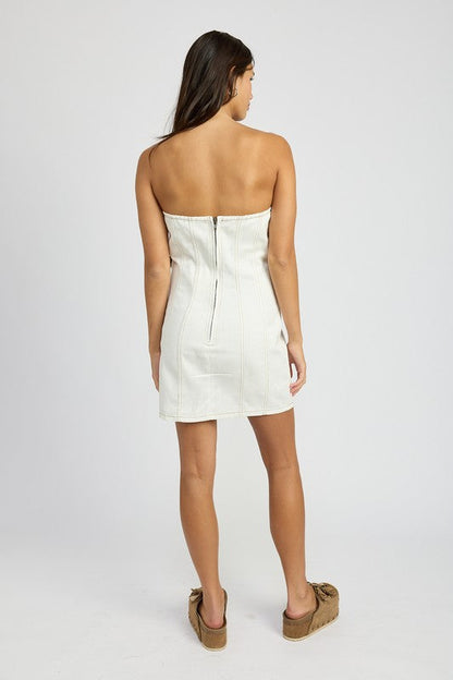 Jade Icarus denim tube dress with rosette detail, showcasing the textured fabric and decorative floral accents.