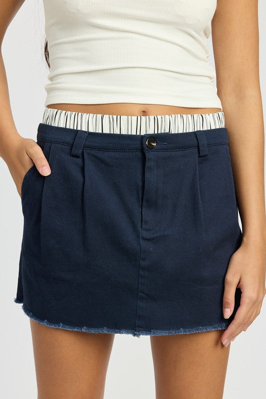 Automotive Jade Icarus double waisted hybrid mini skirt with sleek design, displayed on a mannequin.