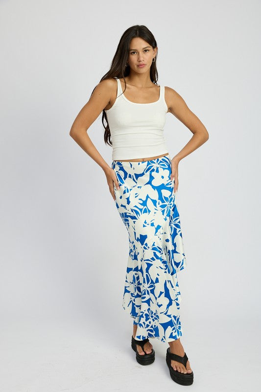 Automotive asymmetrical ruffle hem skirt by Jade Icarus, featuring a stylish, flowing design with layered ruffles and unique hem detail.