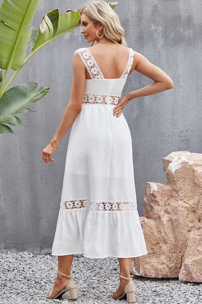 Jade Icarus Tory midi dress for women shown in a stylish, flowy design with a fitted waist and elegant neckline.
