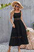 Jade Icarus Tory midi dress for women, stylish and elegant with a flowing silhouette, worn by a model outdoors.