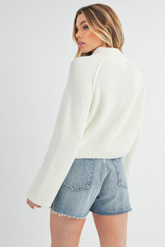 Jade Icarus Debbie half-zip sweater for women, lightweight knit with collar and long sleeves, in a cozy, stylish design.