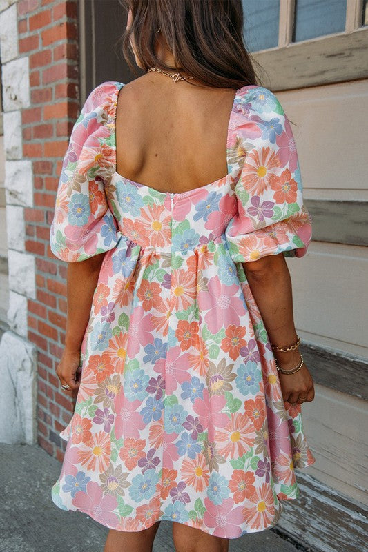 Women’s square neck puff sleeve babydoll dress by Jade Icarus, featuring a stylish design with puffed sleeves and a square neckline.