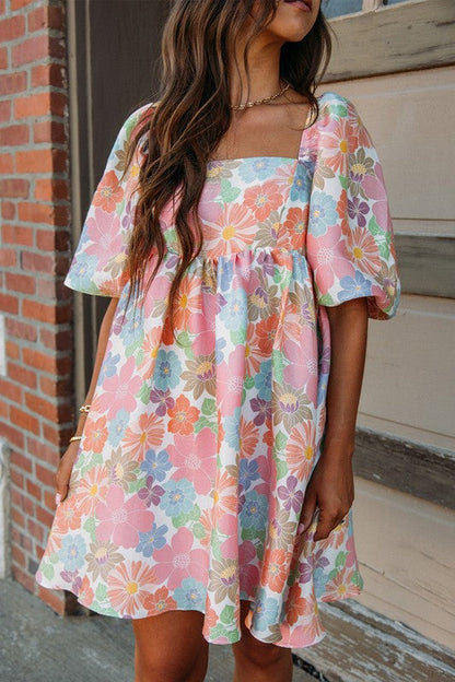 Women’s square neck puff sleeve babydoll dress by Jade Icarus, showing the dress&