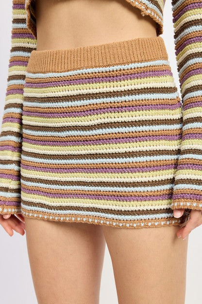 Jade Icarus low rise striped crochet mini skirt, automotive style fashion, showing the textured crochet fabric and colorful stripe pattern.