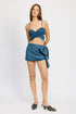Light blue denim mini skirt with bow detail from Jade Icarus, featuring a fitted waist and stylish design for women&
