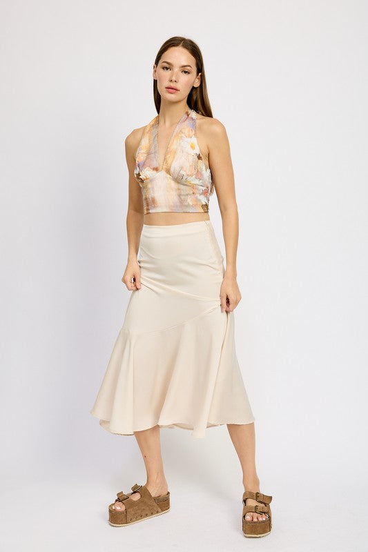 Jade Icarus asymmetrical ruffle hem skirt with layered fabric details, displayed on a mannequin.
