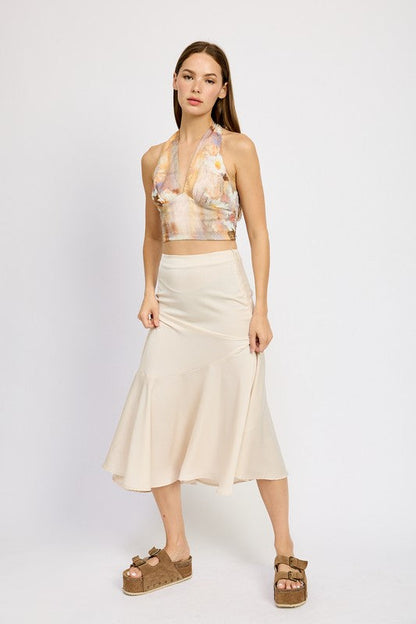 Jade Icarus asymmetrical ruffle hem skirt with layered fabric details, displayed on a mannequin.