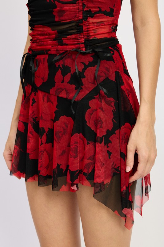 Jade Icarus asymmetrical sharkbite hem mini skirt with automotive-inspired design and unique hem detail.