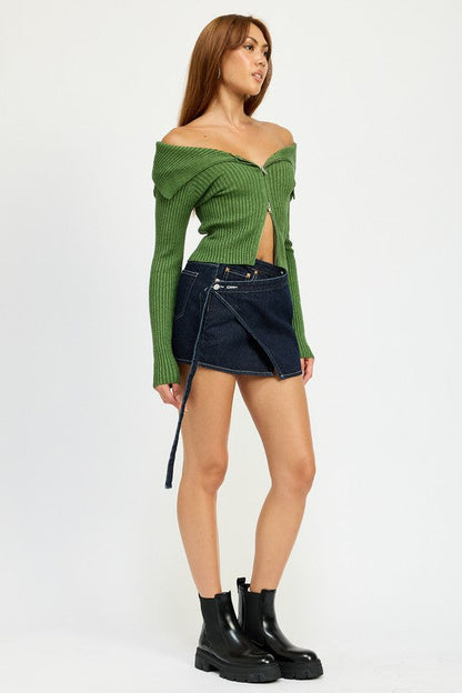 Automotive wrapped mini denim skirt by Jade Icarus, featuring a unique denim wrap design with stitching details.