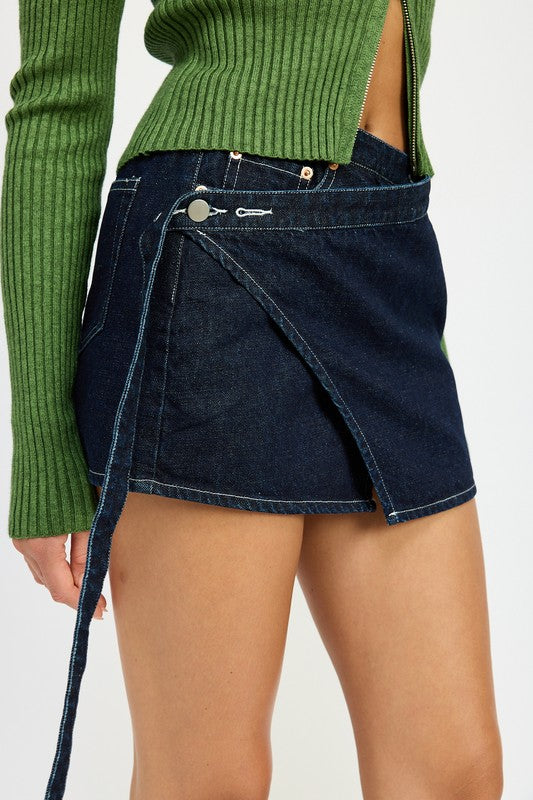 Automotive wrapped mini denim skirt by Jade Icarus featuring detailed denim fabric and stylish design.