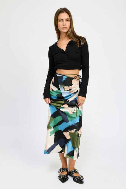 Side ruched Jade Icarus midi skirt with automotive-inspired design, featuring a sleek, fitted silhouette and detailed ruching.