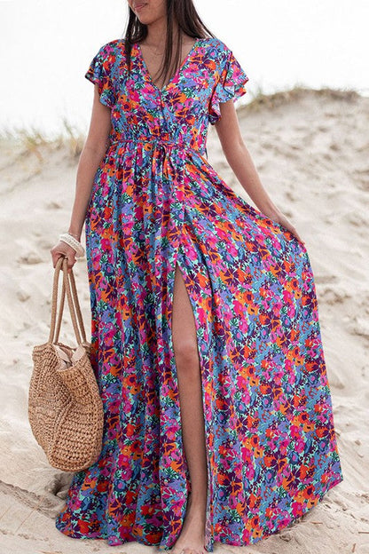 Women’s floral print V-neck wrap maxi dress by Jade Icarus, featuring a split design and elegant floral pattern.