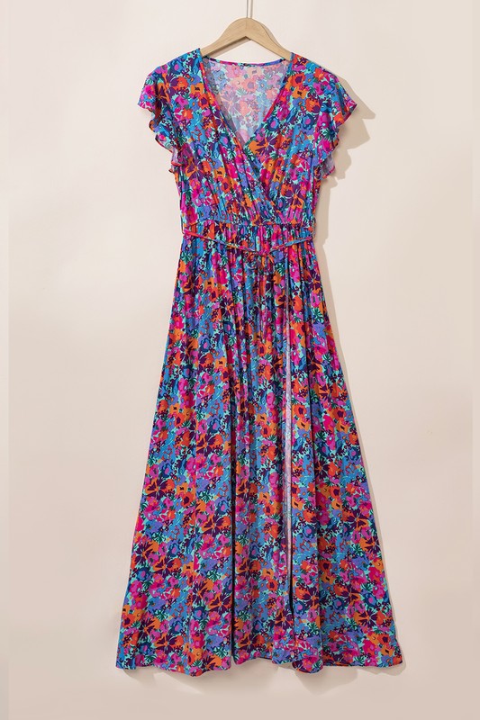 Women’s floral print V-neck wrap split maxi dress by Jade Icarus, featuring a flowing design and vibrant floral pattern.