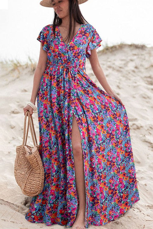 Women’s floral print V-neck wrap split maxi dress by Jade Icarus, featuring a flowy fabric and elegant design.