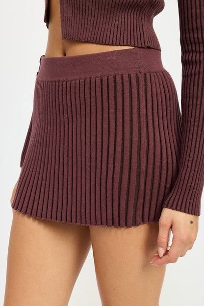 Automotive Jade Icarus ribbed knit mini skirt with textured ribbed pattern, displayed on a neutral background.
