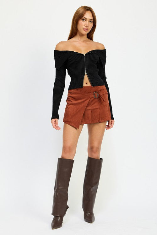 Jade Icarus wrapped buckle belt mini skirt featuring a stylish design and versatile fit, shown on a model.