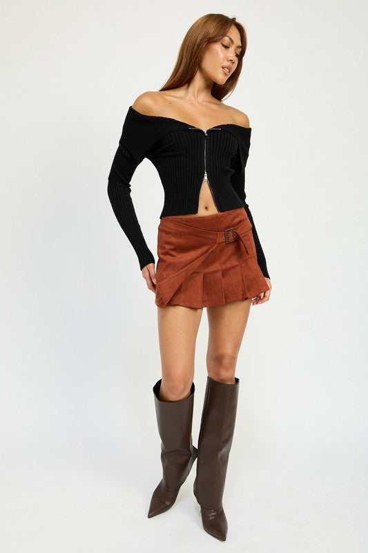 Jade Icarus wrapped buckle belt mini skirt featuring a stylish design with buckle details and a fitted silhouette.