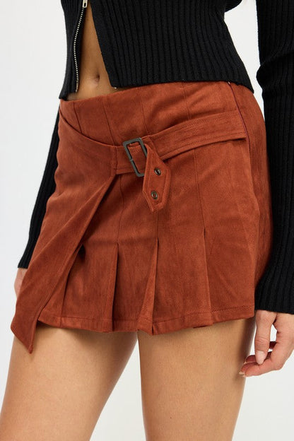 Jade Icarus wrapped buckle belt mini skirt in black, featuring a stylish belt detail and fitted silhouette for a trendy look.